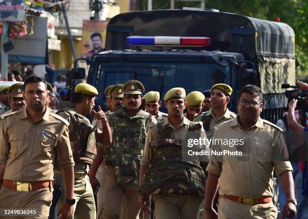 Atiq Ahmad is taken to prison by police after being convicted in session court , for Umesh Pal Kidnapping case , in Allahabad on March 28, 2023.