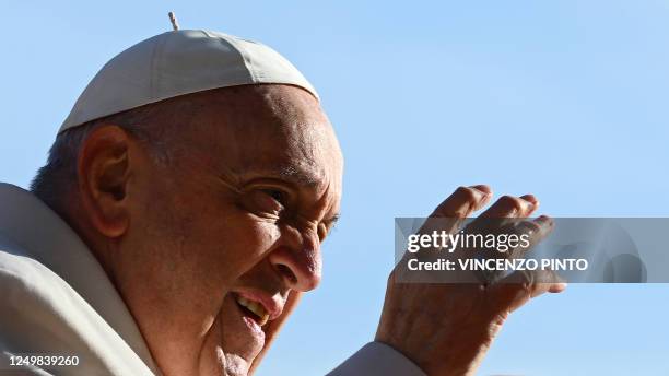 Pope Francis waves from the popemobile car as he arrives at St. Peter's square on March 29, 2023 in The Vatican to hold the weekly general audience.