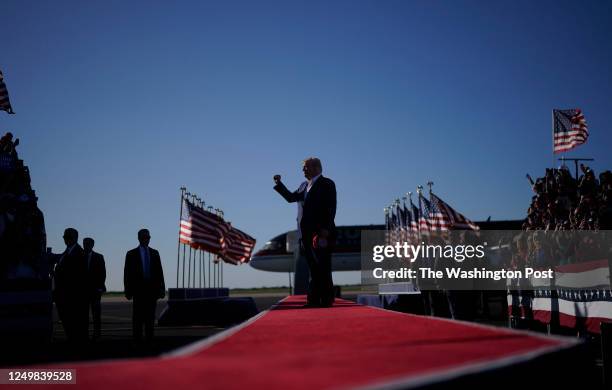 Former president Donald Trump arrives for a campaign rally at Waco Regional Airport in Waco, Texas on Saturday, March 25, 2023.