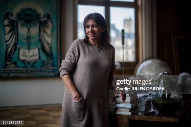 Paris Mayor Anne Hidalgo poses in her office during a photo session in Paris, on March 28, 2023.