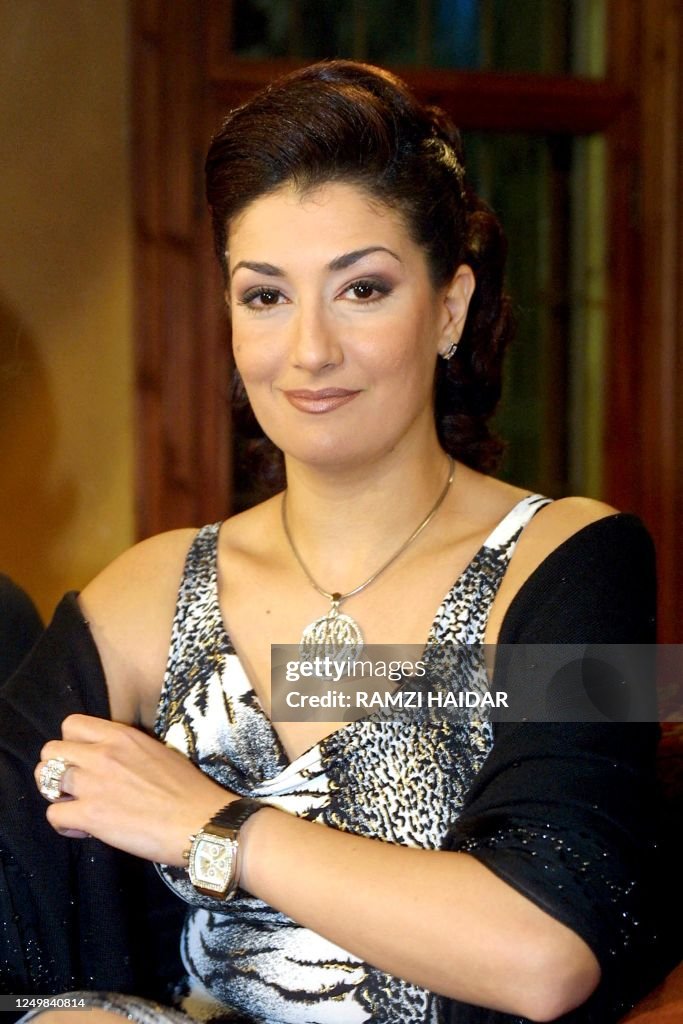 Egyptian actress Ghada Abdel Razek poses during an interview at... News ...