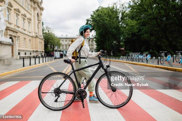 cross the road safe with a bicycle - pedestrian safety stock pictures, royalty-free photos & images