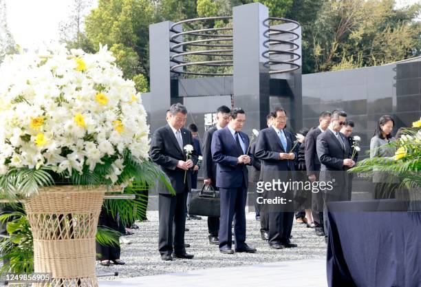 Former Taiwan president Ma Ying-jeou pays his respects at the Memorial Hall of the Victims in Nanjing Massacre by Japanese Invaders in Nanjing, in...
