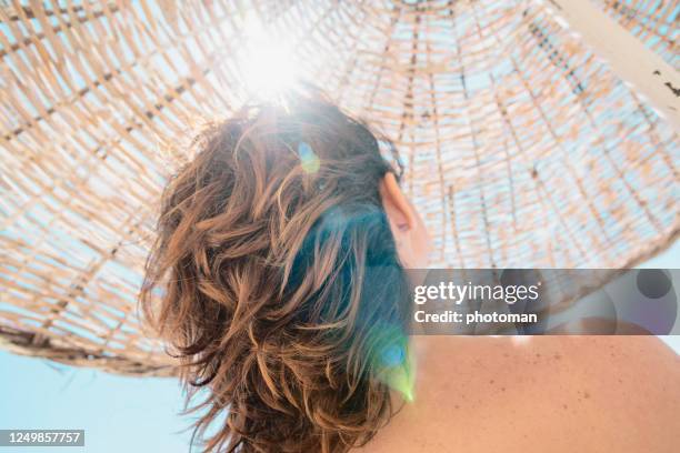 summer at beach. - human hair strand stock pictures, royalty-free photos & images