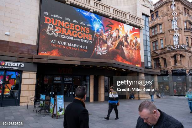 Poster for the fantasy movie Dungeons & Dragons Honour Among Thieves outside the Vue cinema in Leicester Square on 27th March 2023 in London, United...