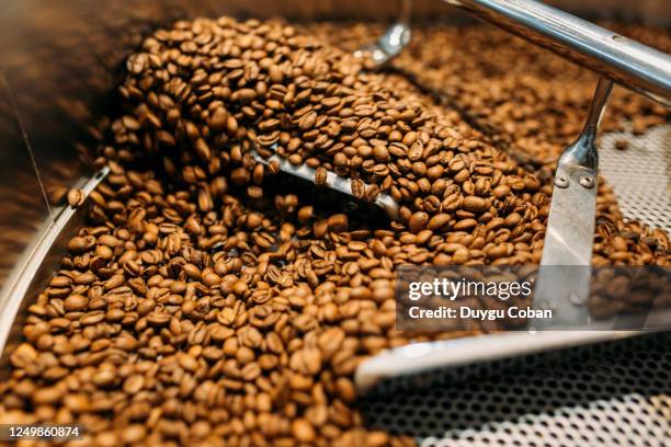 coffee roasting - coffee manufacturing stock pictures, royalty-free photos & images