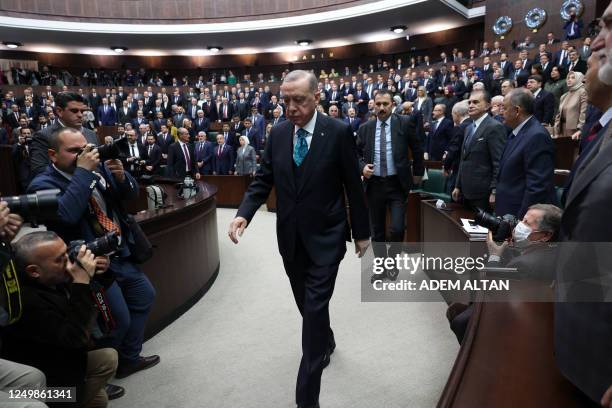 Turkish President and leader of the Justice and Development Party , Recep Tayyip Erdogan arrives to deliver a speech during his party's group meeting...