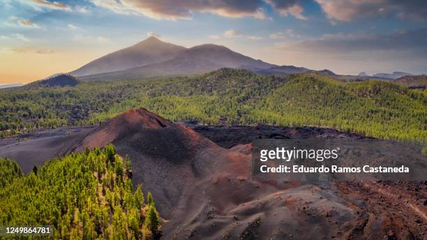 chinyero volcano with mount teide behind from a drone - pico de teide stock pictures, royalty-free photos & images