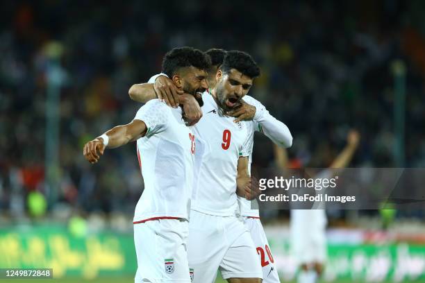 Ramin Rezaeian of Iran celebrates after scoring his teams second goal with team mates Mehdi Taremi of Iran during the international Friendly match...
