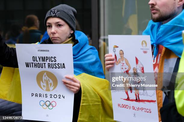 Group of Ukrainians demonstrate in front of the European headquarter of the International Olympic Committee on March 29, 2023 in Brussels, Belgium....