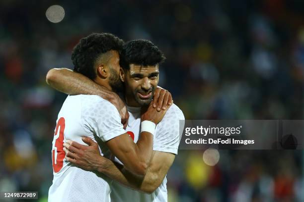 Ramin Rezaeian of Iran celebrates after scoring his teams second goal with team mates Mehdi Taremi of Iran during the international Friendly match...
