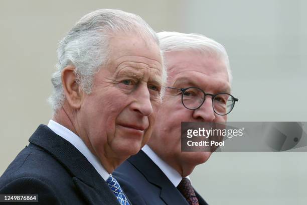 Britain's King Charles III and German President Frank-Walter Steinmeier attend a ceremonial welcome at Brandenburg Gate on March 29, 2023 in Berlin,...
