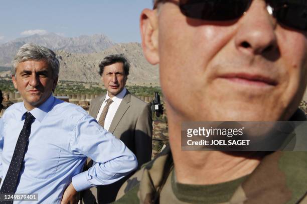 France Televisions head Patrick de Carolis and France's Defence Minister Herve Morin are pictured on June 22, 2010 in Kapisa province at Tagab...