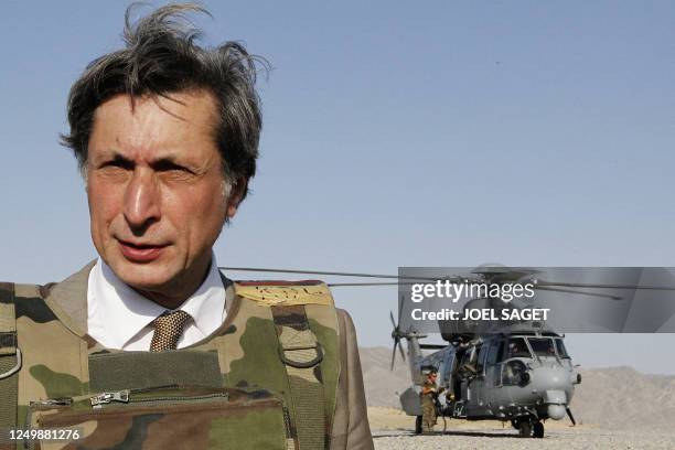 France Televisions head Patrick de Carolis stands next to a Caracal helicopter on June 22, 2010 in Kapisa area at Tagab military base. France's...