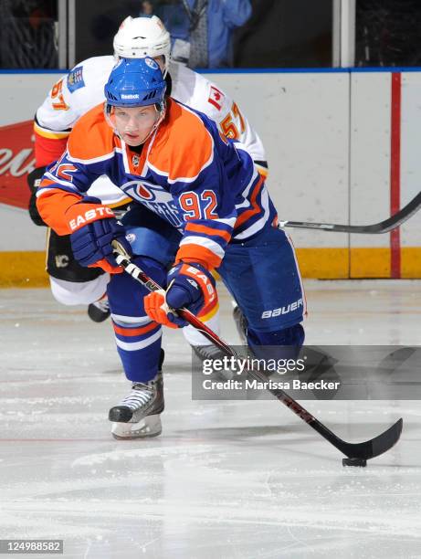 Tony Rajala of the Edmonton Oilers skates with the puck against the Calgary Flames during day four of the 2011 Vancouver Canucks NHL Young Stars...