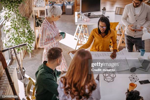 multi-ethnic group of people in a discussion - beer mat stock pictures, royalty-free photos & images