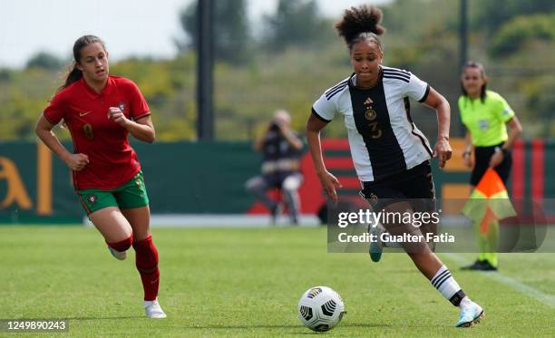 Lisa Baum of Germany with Neide Guedes of Portugal in action during the UEFA Women's Under-17 Championship Estonia 2023 qualification match between...