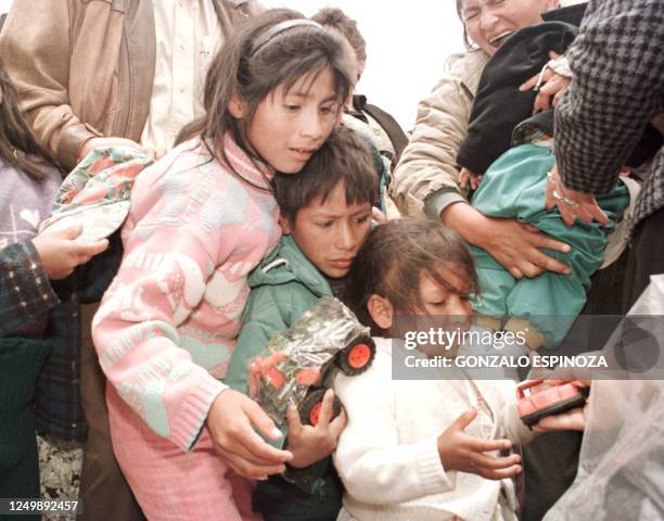 Bolivian children from poor families receive toys 06 January as part of the Feast of the Three Kings in El Alto, a municipality adjoining La Paz....