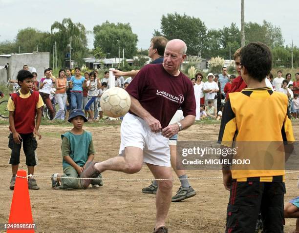 Bobby Charlton , 1966 world soccer champion for England and member of the Laureus World Sports Academy, plays with underprivileged children, 28...