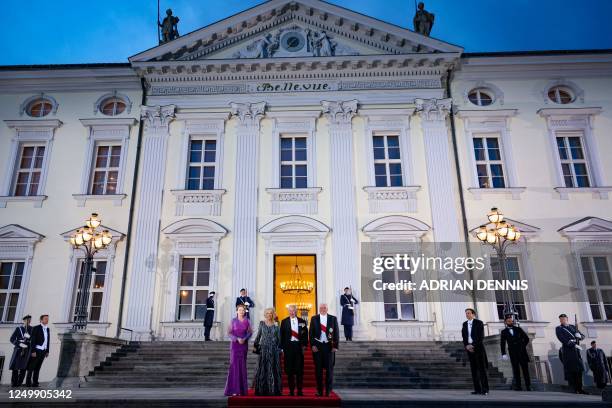 Britain's King Charles III and Britain's Camilla, Queen Consort are welcomed by German President Frank-Walter Steinmeier and his wife Elke...