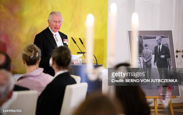 Britain's King Charles III speaks to guests at a state banquet at the presidential Bellevue Palace in Berlin, on March 29, 2023. Britain's King...