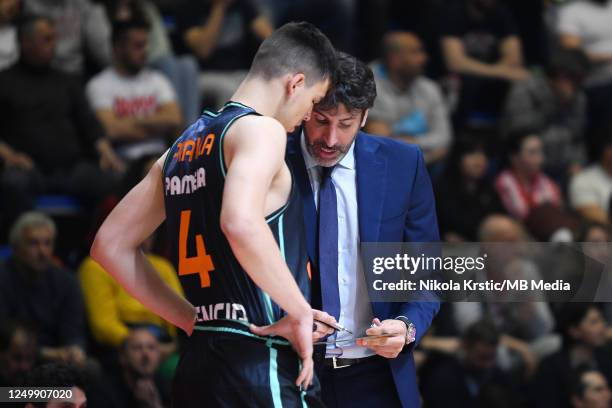 Head Coach Alex Mumbru of Valencia Basket gives advice to Jaime Pradilla of Valencia Basket during the 2022/2023 Turkish Airlines EuroLeague match...