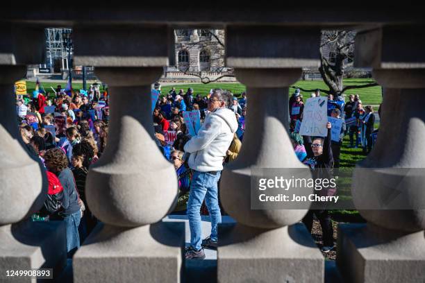 People gather during a rally to protest the passing of SB 150 on March 29, 2023 at the Kentucky State Capitol in Frankfort, Kentucky. SB 150, which...