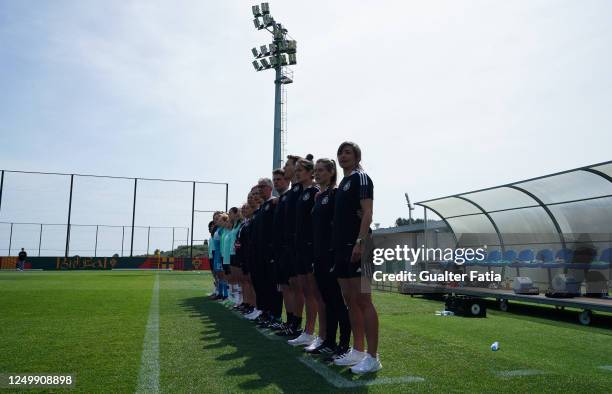 Sabine Loderer of Germany with staff members and players during the National Anthem before the start of the UEFA Women's Under-17 Championship...