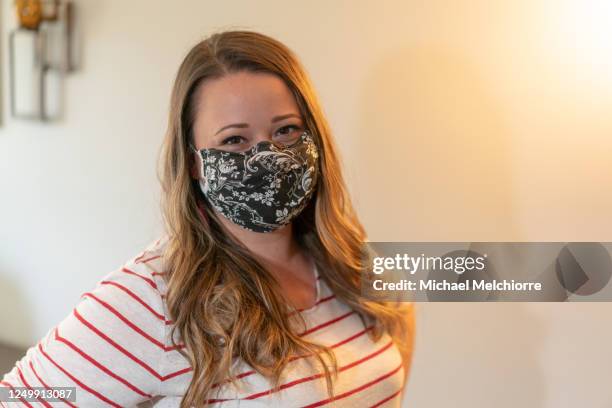 smiling behind the mask - toledo ohio stockfoto's en -beelden