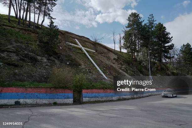 Montenegrin Serbs clero-nationalists decorate the entrance of Berane with colours of the Serbian flag, a cross with the sign of the Serbian Orthodox...