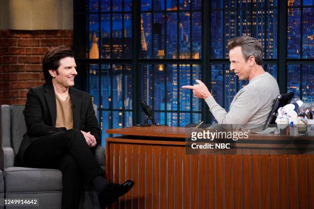 Episode 1411 -- Pictured: Actor Adam Scott during an interview with host Seth Meyers on March 29, 2023 --
