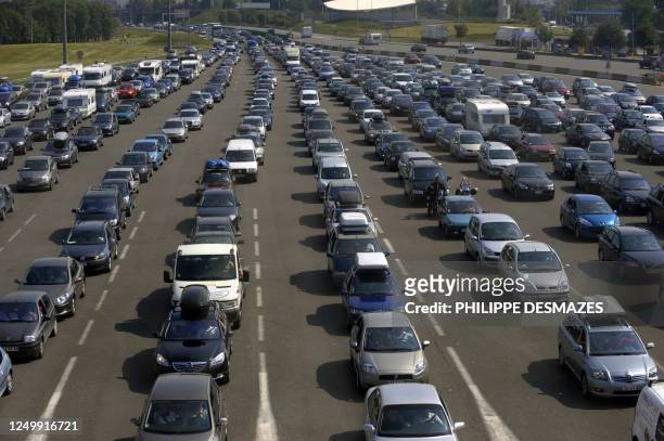 Motorists are stranded on a highway on July 3, 2010 near Villefranche-sur-Saône, eastern France, for the first weekend of summer break departure. AFP...