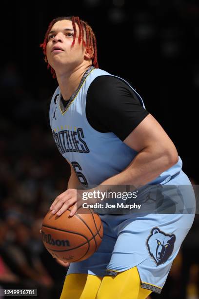 Kenneth Lofton Jr. #6 of the Memphis Grizzlies shoots a free throw during the game against the LA Clippers on March 29, 2023 at FedExForum in...