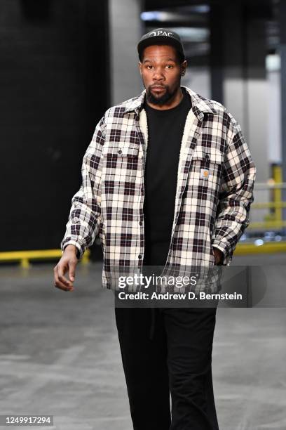 March 29: Kevin Durant of the Phoenix Suns arrives to the arena prior to the game against the Minnesota Timberwolves on March 29, 2022 at Footprint...