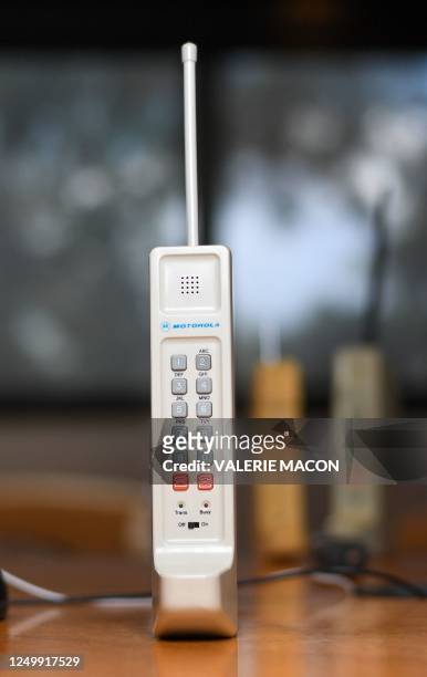 Contemporary copy of the original cell phone that engineer Martin Cooper used to make the first mobile call on April 3 is on display in Del Mar,...