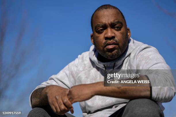 Community activist and gun violence survivor Oronde McClain, who was shot in the back of the head at 10 years old, poses for a portrait in...