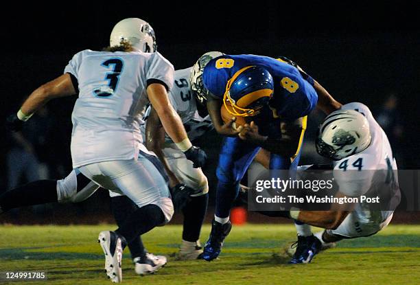 Stone Bridge's quarterback sack in the second quarter on September 1, 2011. Stone Bridge's Adam Kiphuth takes down Robinson QB Avyn Johnson. Stone...