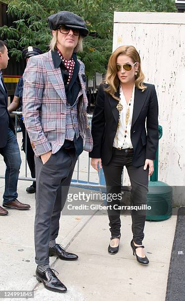 Lisa Marie Presley and husband Michael Lockwood are seen around Lincoln Center during Spring 2012 Mercedes-Benz Fashion Week on September 14, 2011 in...