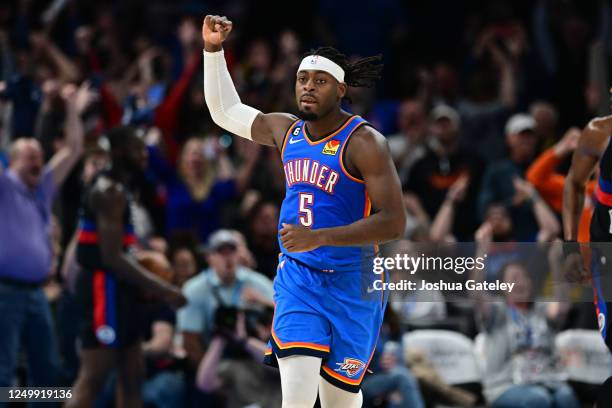 Luguentz Dort of the Oklahoma City Thunder celebrates the win against the Detroit Pistons in the fourth quarter at Paycom Center on March 29, 2023 in...