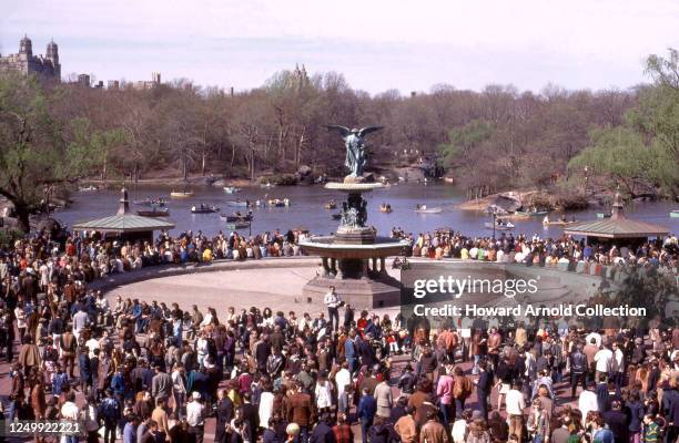 People gather around at the water fountain at the Bethesda Terrace within Central Park circa May, 1969 in New York, New York.