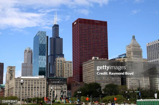 The new Roosevelt University building, Willis Tower and the CNA Building as photographed from the Buckingham Fountain grounds in Chicago, Illinois on...