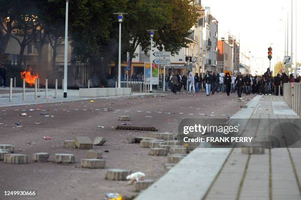 Picture shows cobblestones on the ground during a demonstration against President Nicolas Sarkozy's plan to up the retirement age to 62 on October...