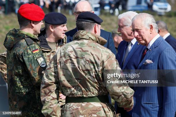 Britain's King Charles III and German President Frank-Walter Steinmeier are welcomed by Brandenburg's State Premier Dietmar Woidke , the Commander of...