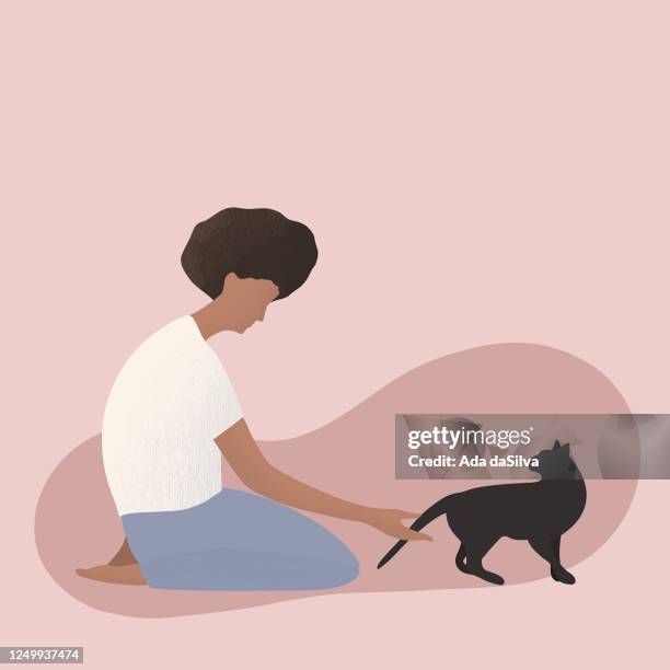 menschen, die mit haustieren leben, mann, frauen, haustier adoption. - undomesticated cat stock-grafiken, -clipart, -cartoons und -symbole