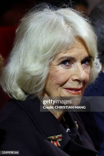 Britain's Camilla, Queen Consort looks right as she sits at Komische Oper Berlin during a visit with German President's wife at the opera house in...