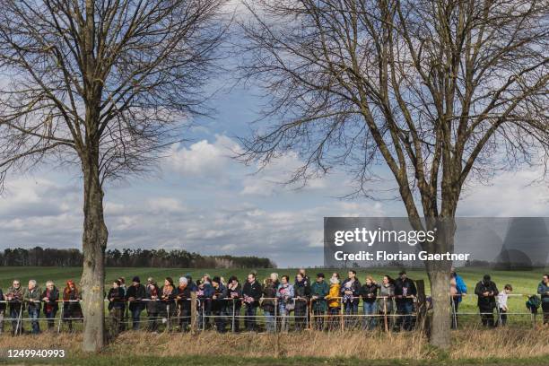 Fans of the Royals and habitants of the village are pictured before the arrival of King Charles III. , Head of State of the United Kingdom, at the...