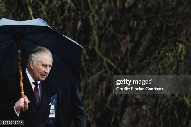 King Charles III., Head of State of the United Kingdom, is pictured during his visit at the eco-village of Brodowin on March 30, 2023 in Brodowin,...