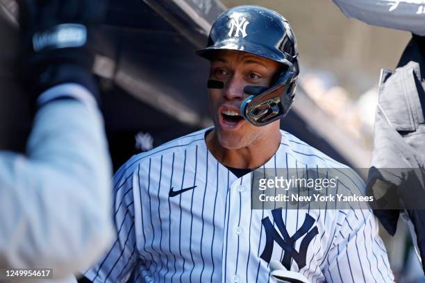 Aaron Judge of the New York Yankees celebrates after hitting a home run during the first inning against the San Francisco Giants on Opening Day at...