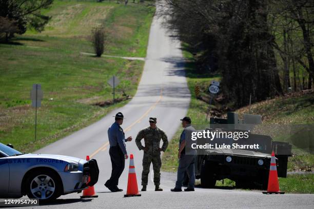 Humvee from the U.S. Army's 101st Airborne Division sits parked at a checkpoint near the site where two UH-60 Blackhawk helicopters crashed on March...