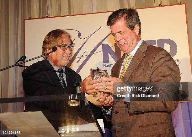 S Rod Essig presents to Nashville Mayor Karl Dean at The Nashville Association Of Talent Directors Honors Gala at The Hermitage Hotel on September...